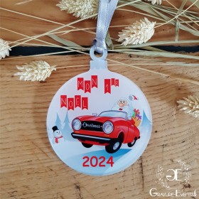 Cette décoration personnalisée, sur le ton de l'humour, à offrir pour le premier noël d'un couple.