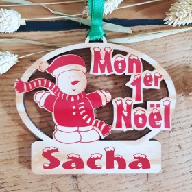 Un souvenir à conserver, la boule en bois mon premier noël avec un bonhomme de neige.