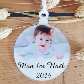 Pour le 1er Noël d'un bébé, offrez lui cette boule mon 1er Noël, personnalisable avec sa photo.