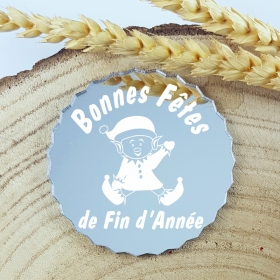 Dessous de verre miroir orné du Lutin du Père Noël, créé et produit dans notre atelier français.